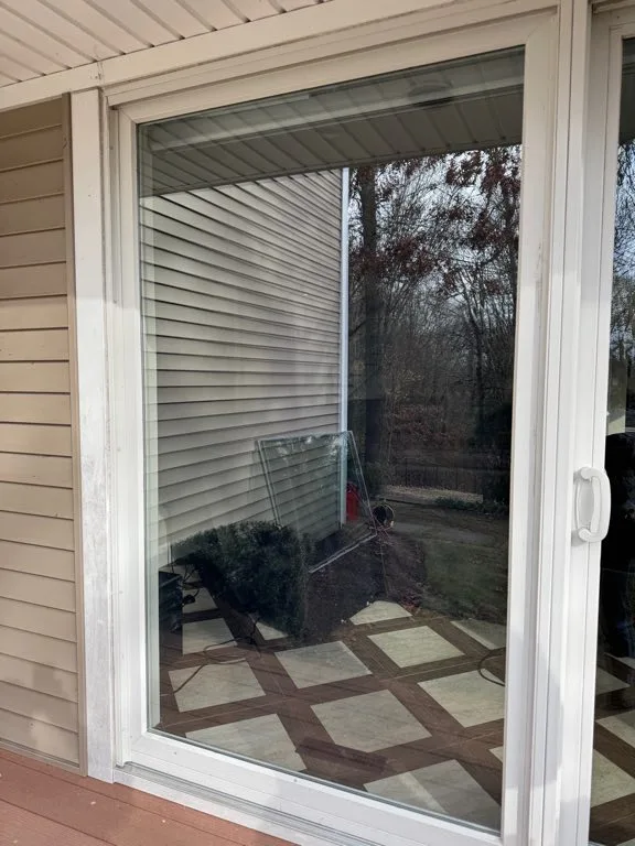 Sliding glass door after repair at residential home in Long Island