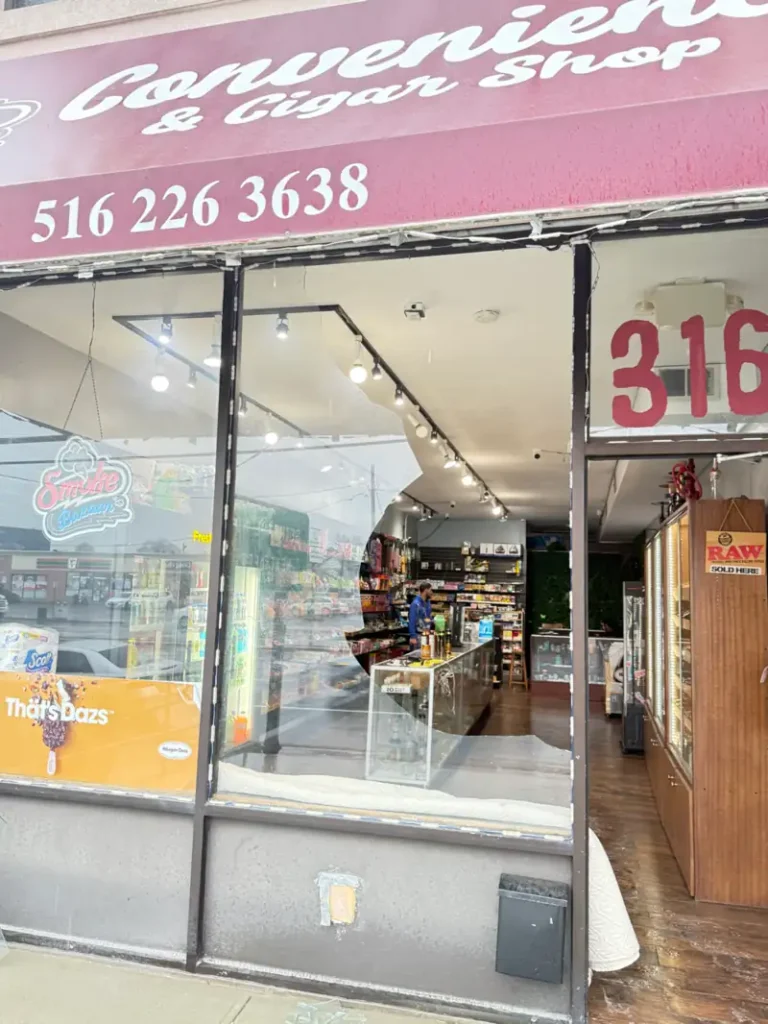 Storefront glass before repair at commercial store in Long Island